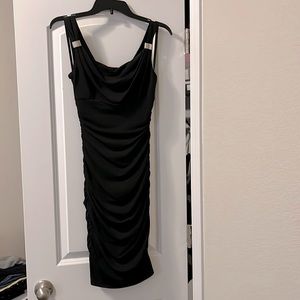 Slimming little black dress from White House Black Market. Never worn. Size 0.
